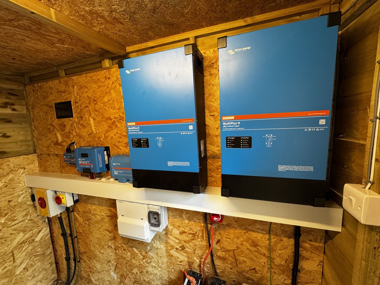 Victron MultiPlus inverters installed on an off-grid plant wall